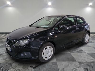 a picture of a black car on a checkered floor