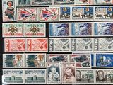 a picture of a collection of stamps from around the world