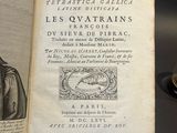 a book with a picture of a man in a robe