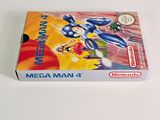 an image of a box of nintendo mega man 4 on a white surface