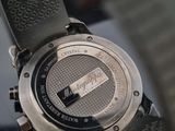 a close up of a watch on a table