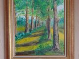 a painting hanging on the wall of a room