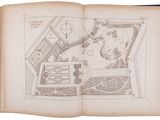 an open book with a drawing of a garden on it