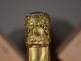 a close up of a bottle of champagne on a table