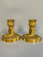 Paire de petit chandelier à décor rocaille. (photo 2)