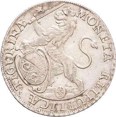 a close up of a silver coin with a lion on it
