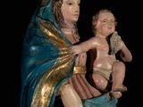 an image of a statue of a woman holding a child