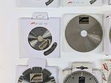 many different types of circular saw blades on the table