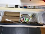 a box of candy and a box of candy inside of a refrigerator
