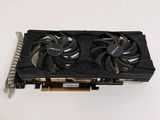 a close up of a video card with two fans on top of it