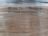 a picture of a box wrapped in plastic on a table