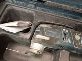 a tool in the case that is sitting on the floor