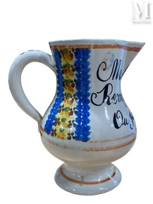 a white and blue vase with a yellow and blue design
