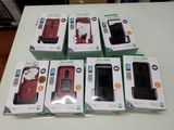 boxes of cell phones sitting on top of a table next to each other