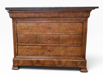 an image of a wooden chest of drawers with a marble top