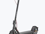 an image of a black electric scooter on a white background