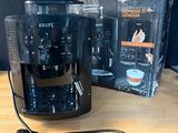 krups coffee maker with box and instructions on table