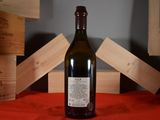 a bottle of wine that is sitting on a table