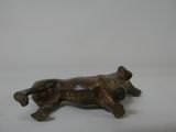 figurine of a running horse on a white background