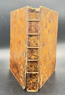 a close up of an old book with a ladder in it