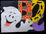 a bag with a picture of a ghost and donuts on it