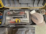 a tool case with tools in it and a hat on top of it
