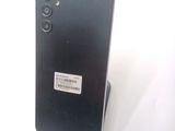 an image of a close up of a cell phone with a barcode on the back
