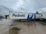 a semi truck that is parked in a parking lot