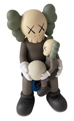 a statue of a man holding a baby in his arms