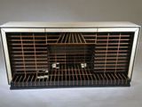 a black and white cabinet with a wine rack in it