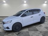 a white car is parked in a room with a checkered floor