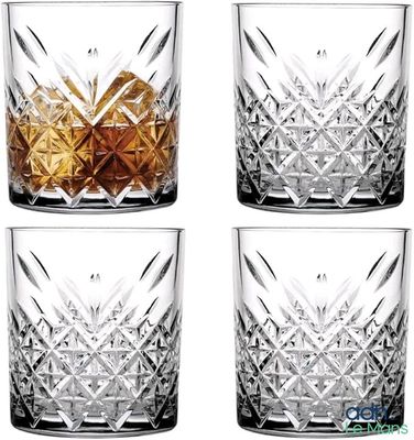 lot de quatre verres en cristal rehaussés de touches dorées et argentées