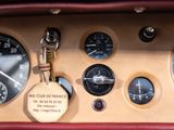 a keychain hanging from the dashboard of a car