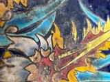a close up of a vase with a dragon on it