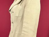 an image of a mannequin suit on a mannequin stand