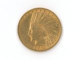 a gold coin with an indian head on it