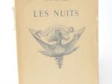 an old book with a picture of a bird on the cover