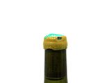 a bottle of wine that is sitting on a table
