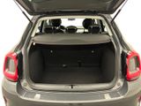 the back of a car with its trunk open and the back seats folded down