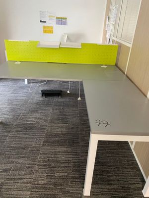 an image of a desk with a computer on it