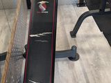 a bench that is sitting on the floor in the gym