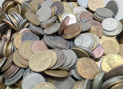 a pile of coins sitting on top of a table