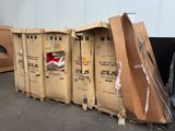 several cardboard boxes are stacked on top of each other in a warehouse