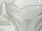 three glasses that are sitting on a table
