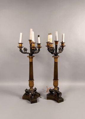 pair of antique brass and marble candelabs with candles