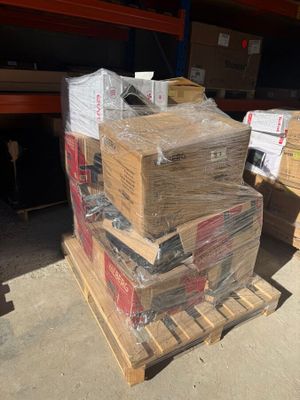 a stack of boxes sitting on a pallet in a warehouse