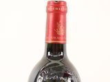 a bottle of wine that is sitting on a table