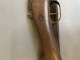 a gun that is sitting on the wall