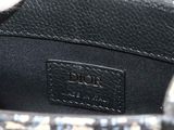the inside of a black and white purse with a black handle