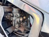 a close up of a carbuke on a vehicle ' s engine